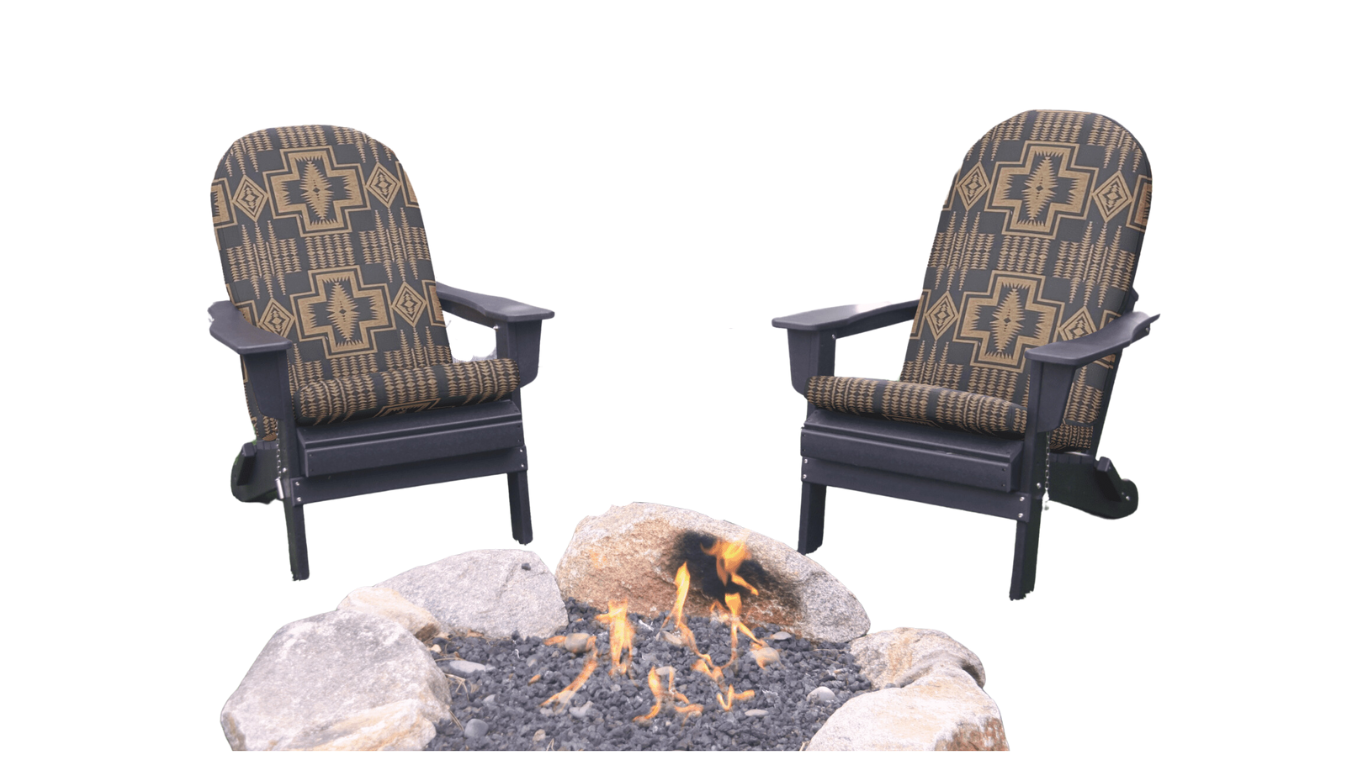 Two Adirondack chairs featuring Pendleton by Sunbrella cushions in a southwest pattern, positioned around a cozy fire pit, evoke a serene outdoor setting.